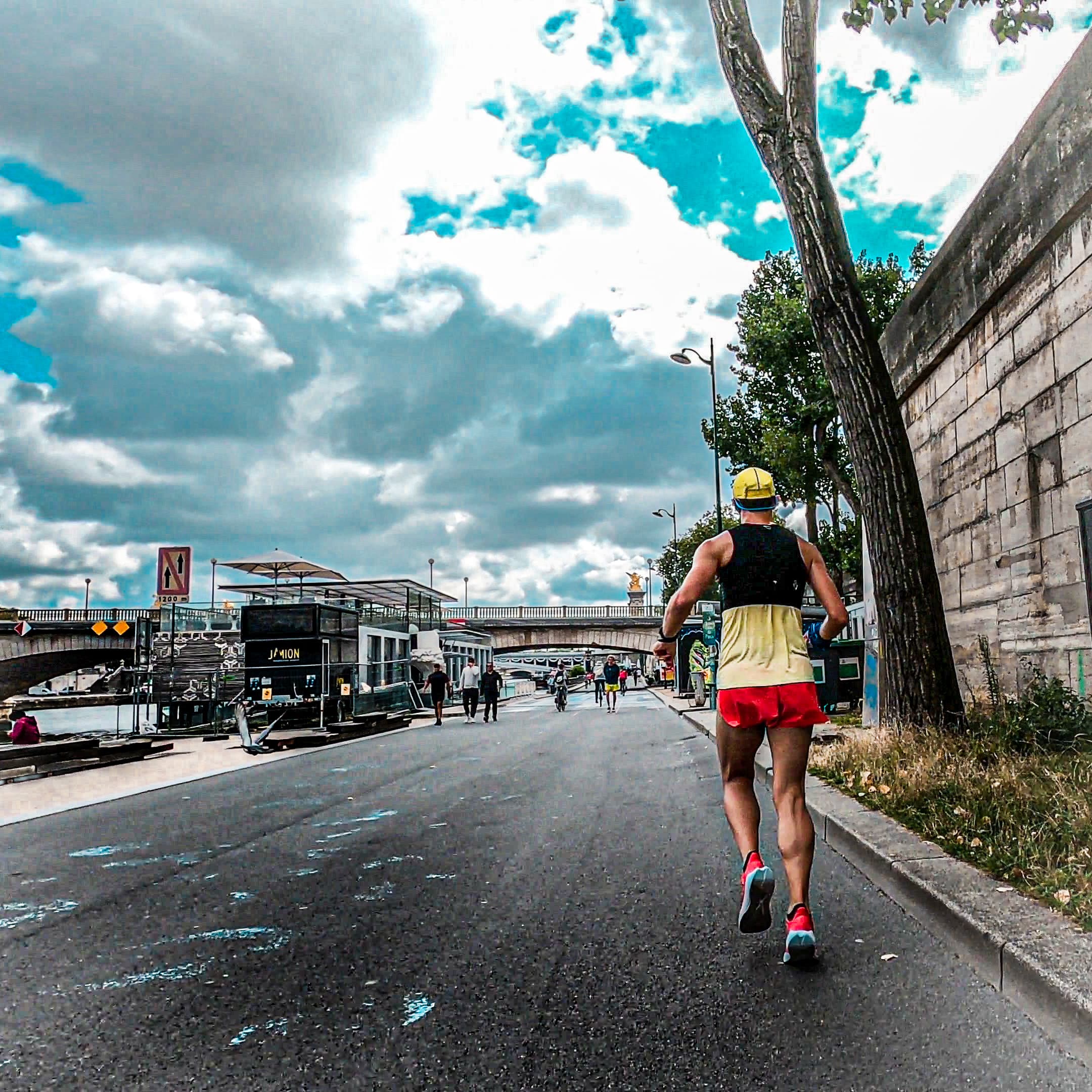 Trail scene with runner in natural terrain